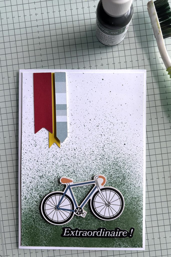 Effet micro-éclaboussures à la brosse à dents avec encre liquide Stampin'Up! sur carte vélo