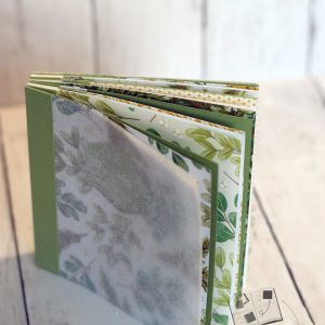 Album photo carré Noël vert et doré reliure collée