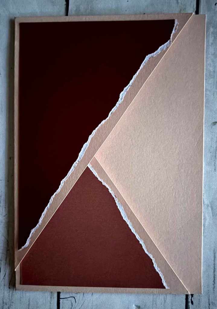 Triangles collés sur la page 3 du carnet de voyage