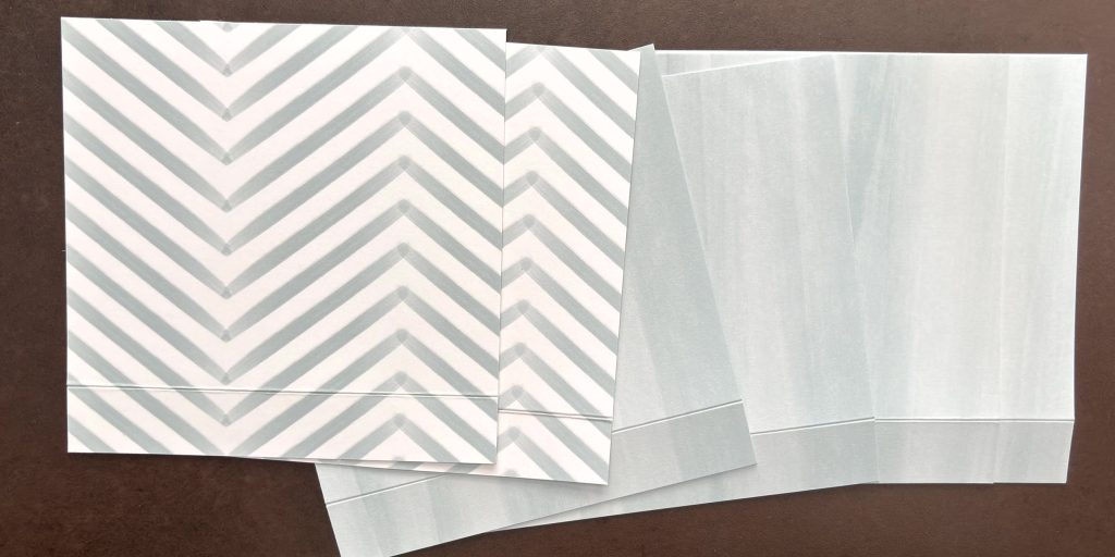 Bande accordéon pliée en papier chevron gris et blanc