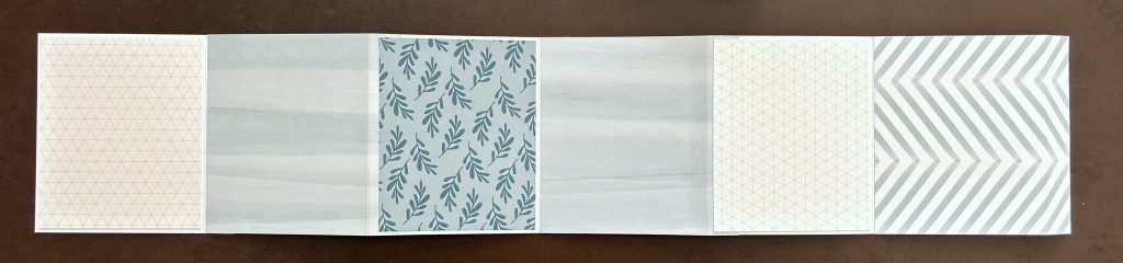 Bande accordéon trois volets en papier pastel à motif sarcelle