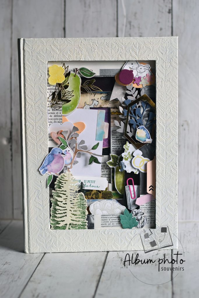 Livre détourné cadre diorama fleurs et animaux, vue de face