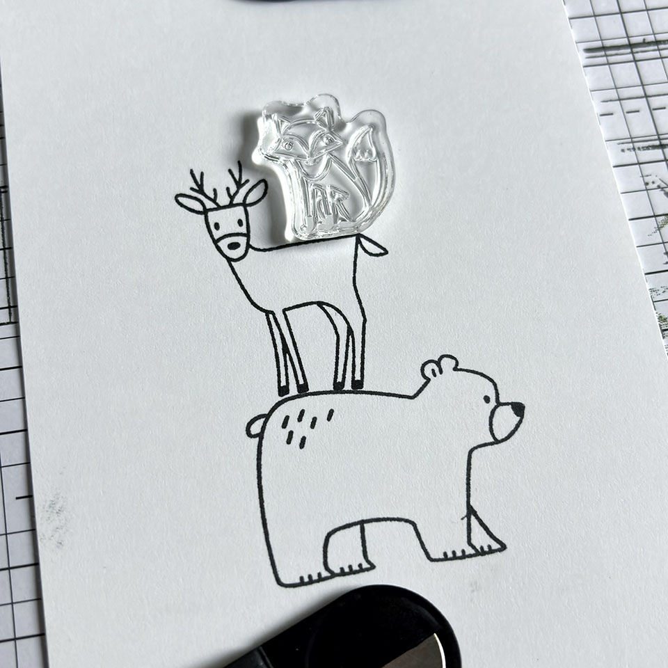 Tamponnage du cerf sur l'ours pour construire la scène avec le positionneur d'images Stampin'Up!